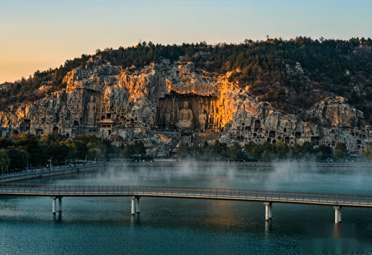 Morning sunrise over the Longmen Grottoes cliffs at the Yi River